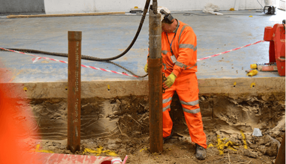 Driven steel-cased piles